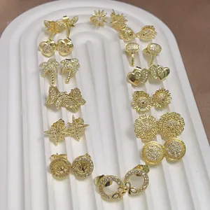 14-pair 18K gold plated stud earring set with butterfly, palm tree and life tree designs