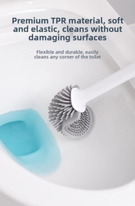 Detail of flexible grey TPR toilet brush head cleaning a toilet bowl surface effectively