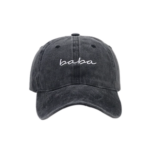 Washed charcoal grey cotton baseball cap with white cursive baba embroidery for sun protection