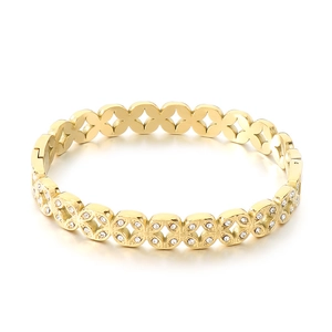 Elegant gold-plated stainless steel hollow bangle featuring intricate cubic zirconia stones