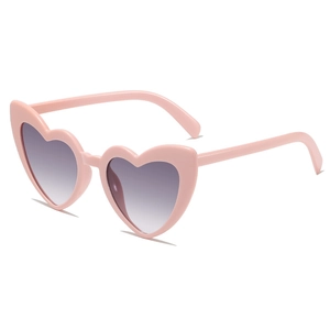 Trendy heart-shaped pink sunglasses with purple gradient lenses for parties and street style