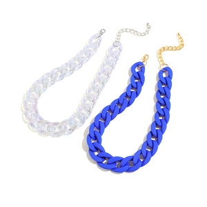 Chunky acrylic cuban link necklaces in iridescent clear and matte blue finishes
