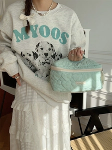 Mint green quilted heart makeup bag with large capacity for travel and skincare storage