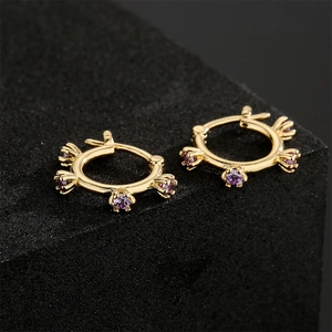 Geometric 18K gold plated copper earrings with AAA purple zircon on black background