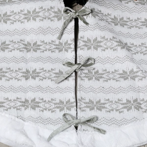 48-inch Christmas tree skirt with gray knit snowflake pattern and white faux fur trim