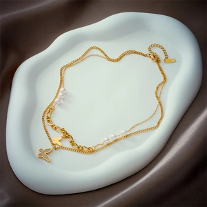 Double-layered 18K gold plated butterfly necklace with white pearls and shell pendants