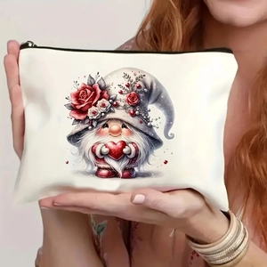 Detailed close-up of a Christmas gnome cosmetic bag being held to show portable size