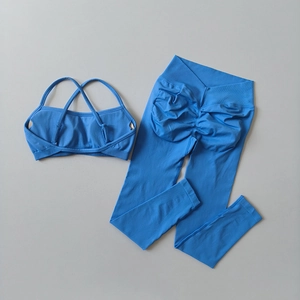 Ensemble de yoga sans couture bleu roi avec brassière croisée et legging taille haute