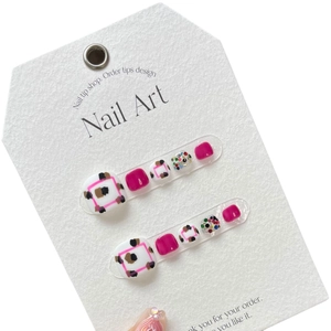 Hot pink leopard print press-on toenails with glitter and diamond accents