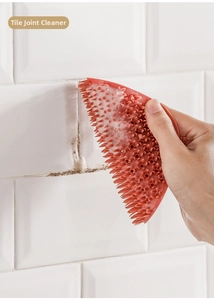 Terracotta silicone crevice cleaning brush effectively scrubbing tile grout with foam