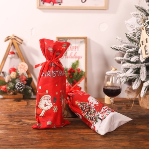 Christmas red wine gift bag with Santa Claus cartoon print on a rustic wooden table
