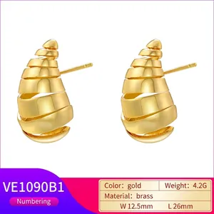 Artistic gold spiral drop earrings in brass with elegant brushed matte finish and hollow design