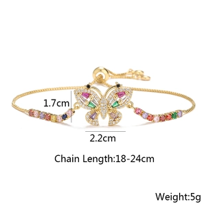 Macro detail of 18K gold-plated butterfly bracelet with colorful zircon and size specs