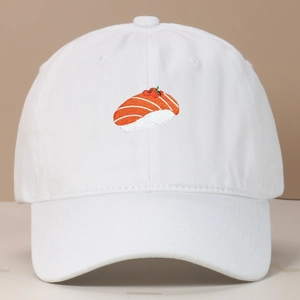 Detailed view of salmon sushi embroidery on white washed cotton baseball cap