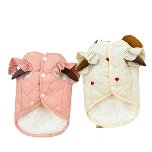 Quilted pet warm vests in pink and beige featuring heart patterns and ruffled sleeves