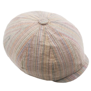 Detail of colorful striped newsboy cap showing textured fabric and top button