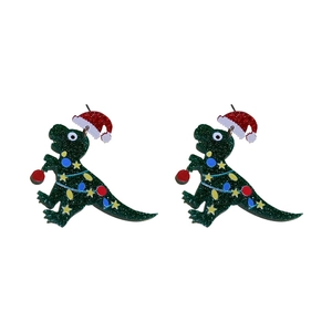 Cute glitter green dinosaur earrings with Christmas hats and colorful festive patterns