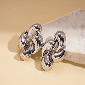 Modern silver metallic irregular fluid teardrop earrings with high-gloss polished finish