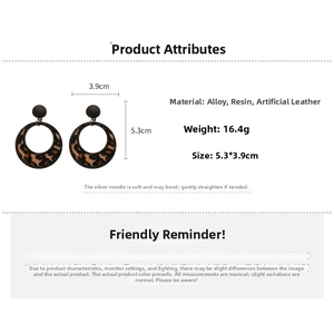 Detailed view of leopard print circle earrings with 5.3x3.9cm size and 16.4g weight specs