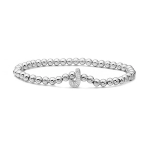 Detailed close-up of a silver beaded bracelet with a zircon-encrusted letter J charm