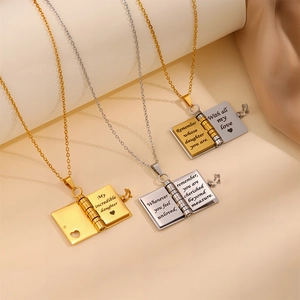 Three engraved stainless steel envelope book necklaces in gold and silver for daughter