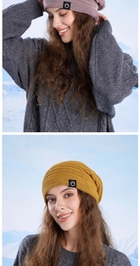 Close-up of fine knit beanie texture and circular mountain logo patch in winter