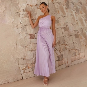 Detail of lavender one shoulder pleated dress showing elegant draping and fabric texture