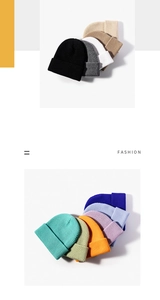 Close-up of assorted ribbed knit beanies in multiple colors arranged in a fan-shaped layout