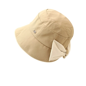 Women's wide brim khaki bucket hat with large bow decoration and metal logo detail