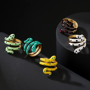 Colorful 18K gold plated snake rings with enamel polka dots in multiple vibrant colors