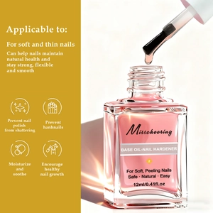 Macro view of 12ml nail hardener pink liquid in glass bottle with applicator brush