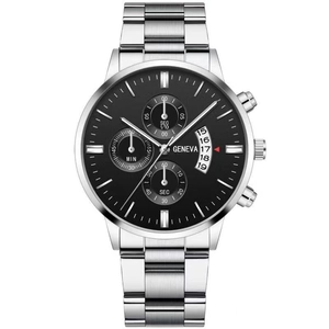 Detailed macro view of silver steel watch dial with calendar window and chronograph sub-dials