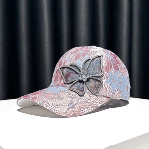 Elegant floral lace baseball cap for women featuring a 3D rhinestone butterfly decoration