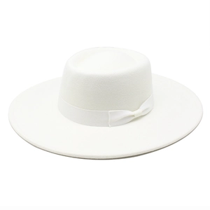 Detailed texture of white wool felt boater hat with a wide brim and elegant grosgrain ribbon