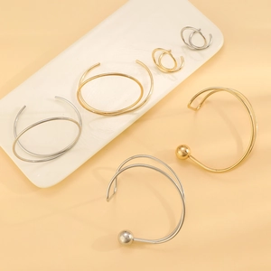 Ensemble bracelet jonc spirale et bague assortie en finitions or et argent