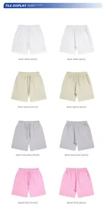 Detail view of cotton sweatshorts in white, apricot, gray blue, and pink color options