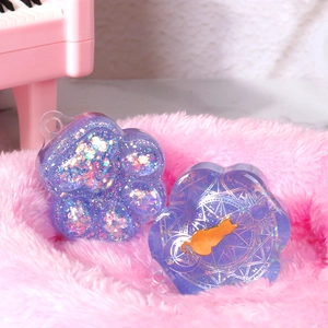 Handmade purple resin cat paw charms with glitter and metallic inlays for DIY jewelry