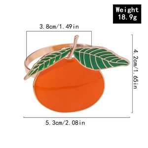 Detail of orange fruit napkin ring with size measurements and orange enamel finish