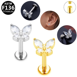 Detail showing G23 titanium butterfly labret with internal thread and cubic zirconia