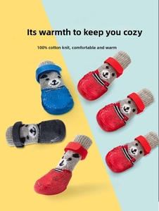 Detail of waterproof rubber soles and adjustable Velcro straps on dog socks