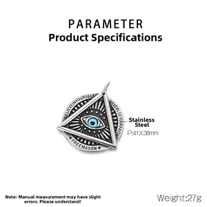 Macro view of stainless steel pyramid pendant with blue all-seeing eye and masonic engraving