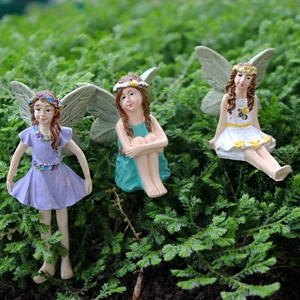 Three resin flower fairy figurines with wings for garden miniature landscape decor