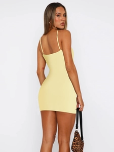 Y2K style pale yellow slim fit mini dress with thin straps and a side slit back view