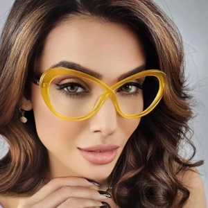 Close-up of oversized yellow transparent TR90 frames on a fashion model for styling