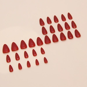 Set of 24 classic glossy red stiletto false nails with a sleek pointed shape for women