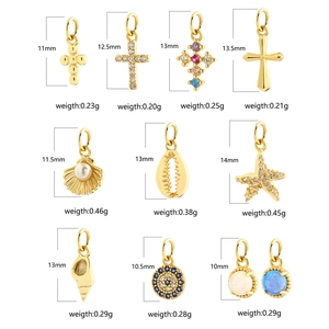 Collection of sterling silver cross, shell and pearl pendants with dimensions and weights