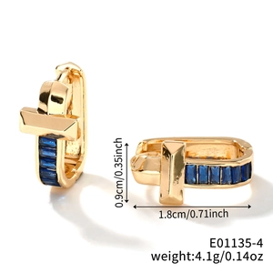 Detailed size view of gold U-shaped earrings featuring blue zircon insets for women
