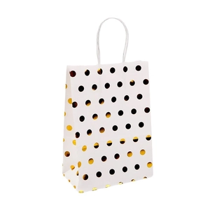 White kraft paper gift bag with elegant gold and black polka dots and sturdy handles