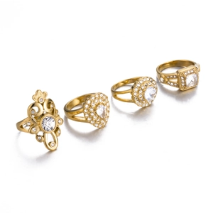 Set of 4 gold stainless steel rings featuring heart and square zircon flower patterns