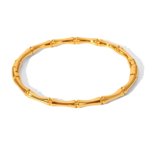 Polished 18k gold stainless steel bamboo shaped bangle in a minimalist jewelry design